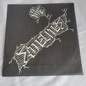 the Sattelites 7"  upright man 1986